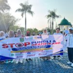 Semangat Integritas di Jalan: Disdukcapil Tanah Bumbu Gelar Jalan Santai dan Kampanye Antipungli